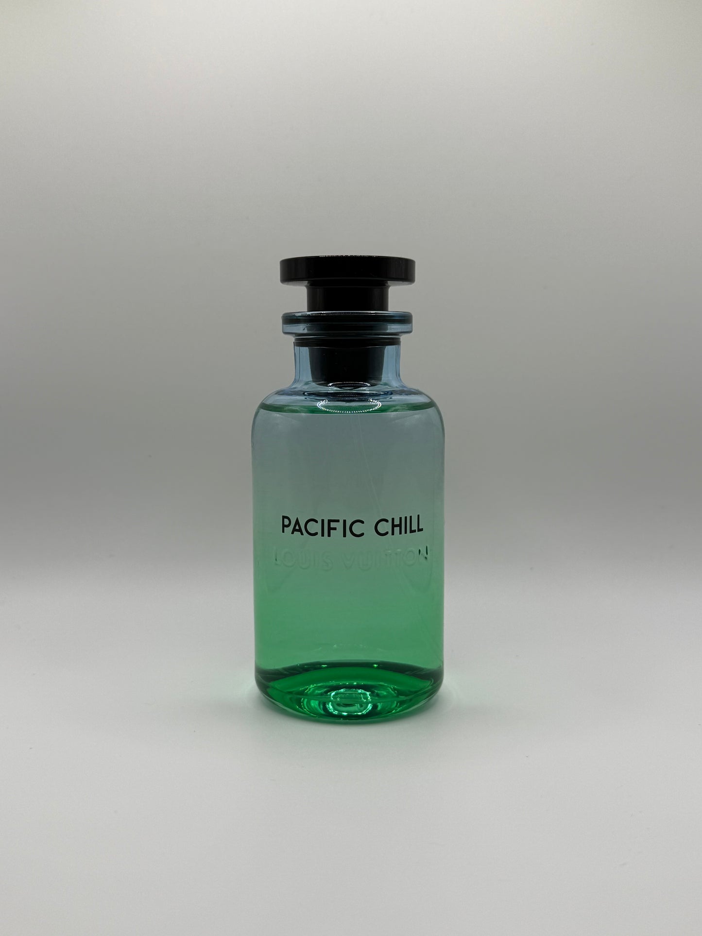Louis Vuitton Pacific Chill perfume bottle with ocean blue and green ombré design