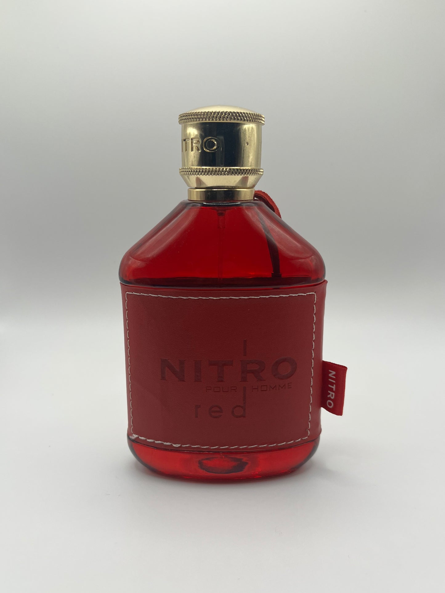 Nitro Red by Dumont decant – fresh woody cologne for men with bergamot, apple, lavender, watermelon, sandalwood, and amber.