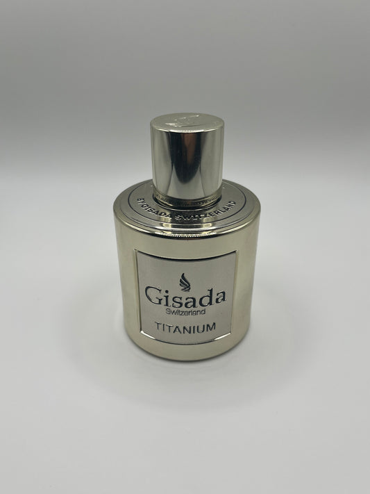 Titanium by Gisada decant bottle – spicy and warm men’s fragrance with pink pepper, leather, and vanilla notes.

