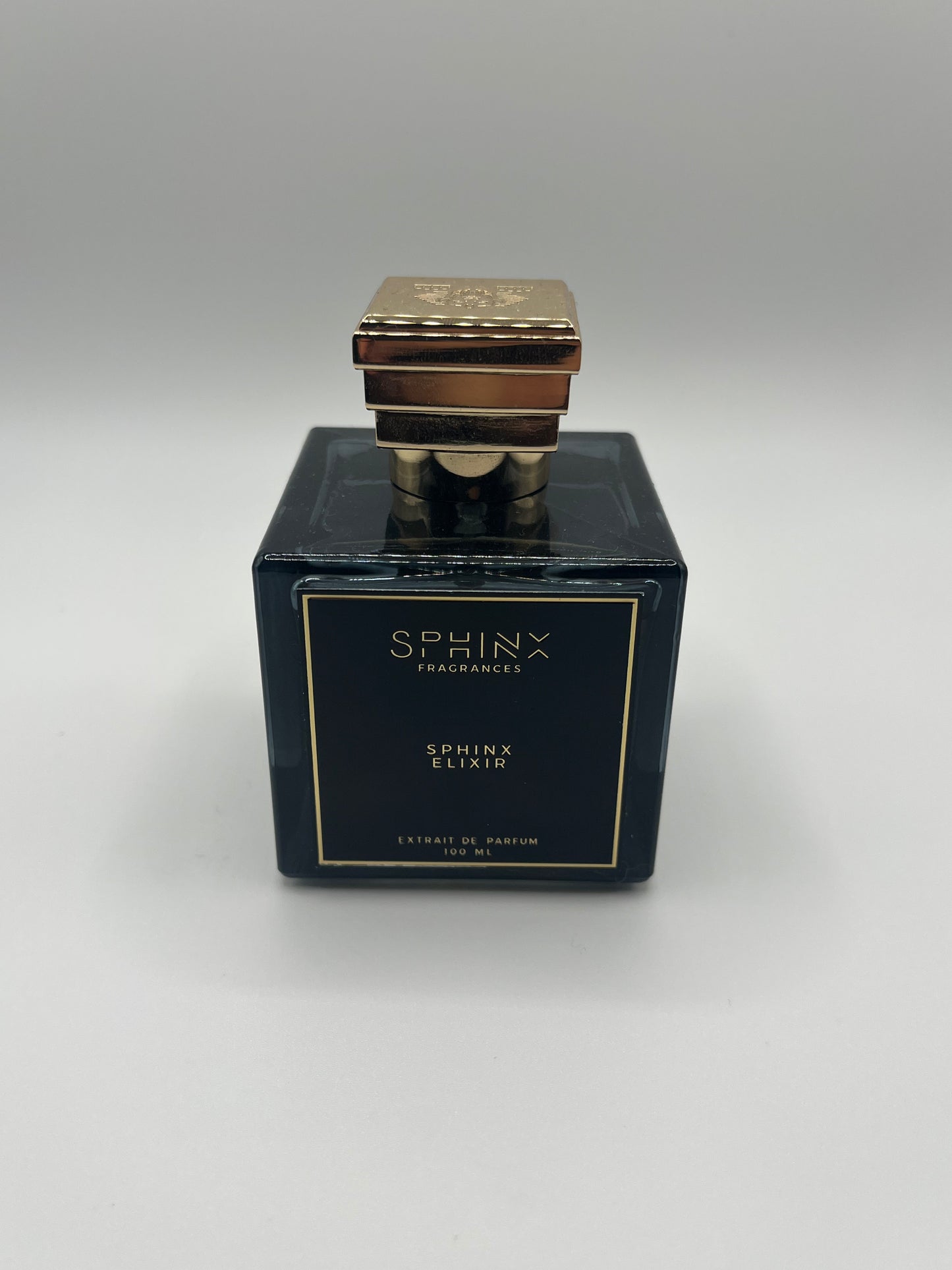 Sphinx Elixir decant – bold amber woody fragrance with bergamot, pink pepper, oud, amber, leather, and ambergris.


