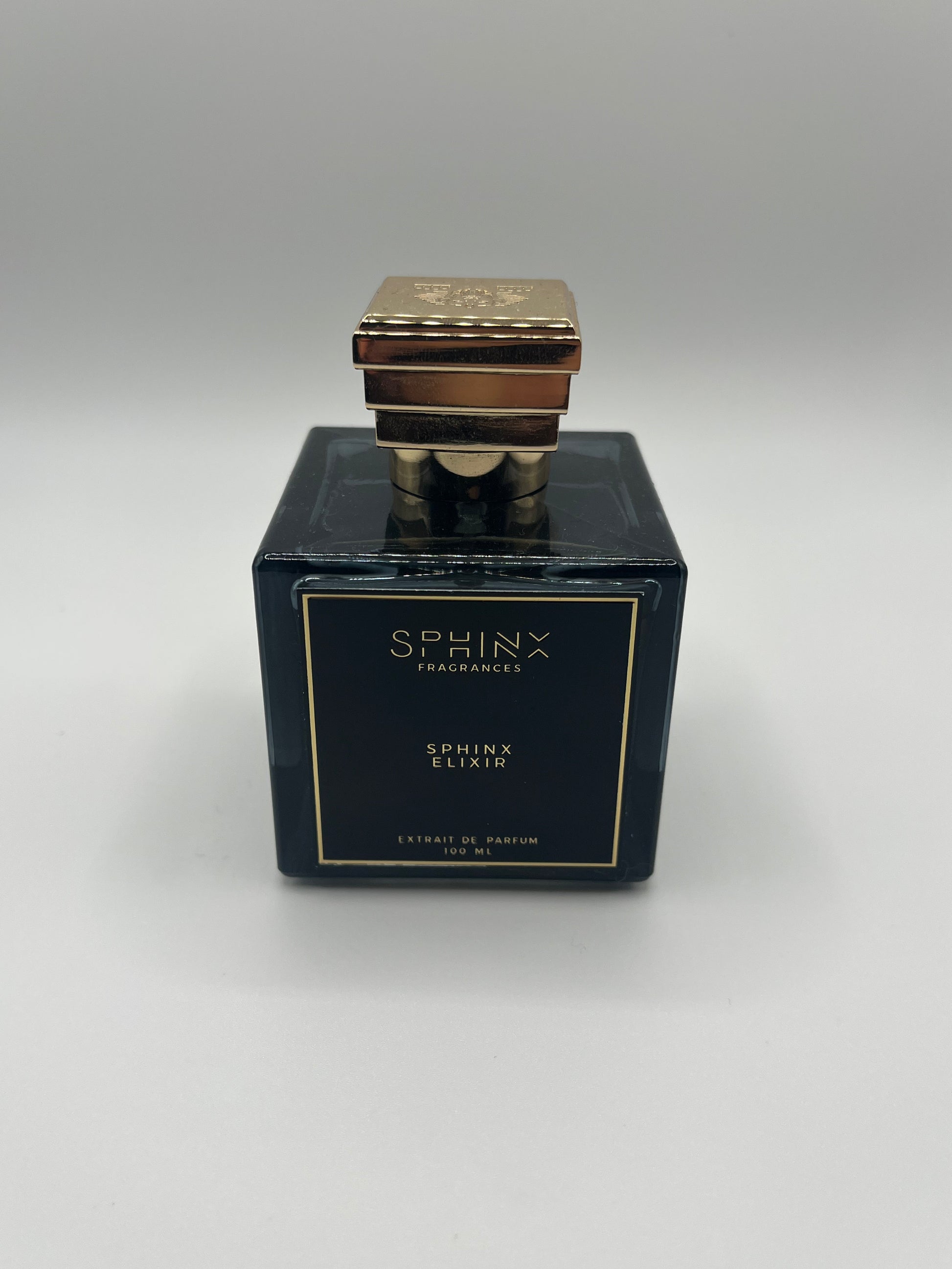 Sphinx Elixir decant – bold amber woody fragrance with bergamot, pink pepper, oud, amber, leather, and ambergris.

